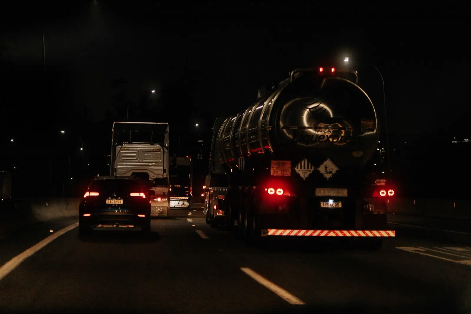 Tail lights on a highway at night (representative photo)